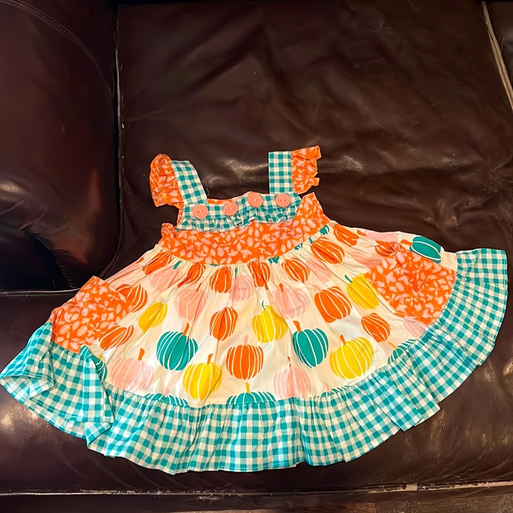 Adorable colorful summer dress for your little one.